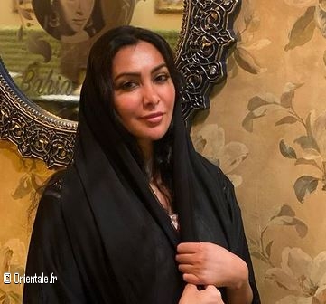 Mirhan Hussein avec un foulard noir, faon hijab