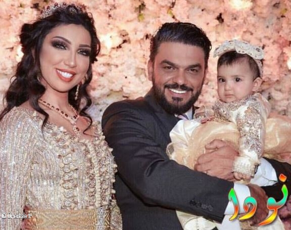 Dounia Batma avec son enfant et son mari, Mohammed al Turk, à l'époque de l'harmonie
